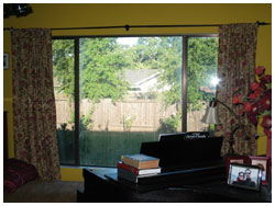 old window prior to replacement - old inefficient aluminum windows without low emissivity coatings