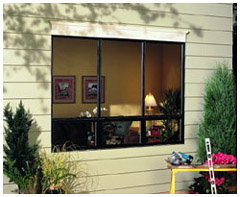old window prior to replacement - old inefficient aluminum windows without low emissivity coatings